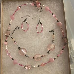 Pink necklace, bracelet and earrings set.